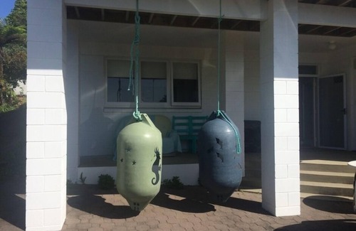 Te Kouma House | Te Kouma, Coromandel. Steps away from safe swimming beach and fishing access.