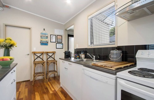 Waihi Beach Cottage | Te Mahana Cottage - pool & private spa, beachfront