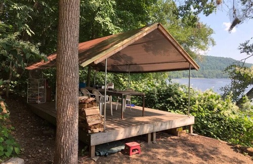 Pond Eddy RV Rental | Tentrr Signature Site - River's Edge Sunset