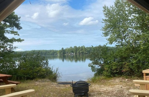 Standish RV Rental | Tentrr Signature Site - An Island view at Kiwanis Beach - Coleman Cooking Site
