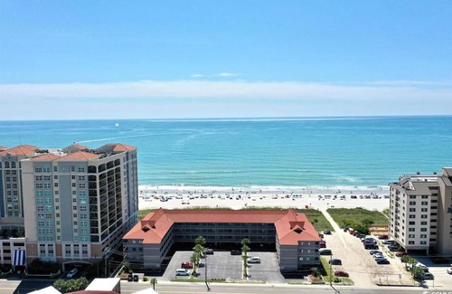 Ocean Drive Apartment | Tequila Sunrise