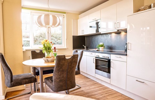 Gohren Apartment | Terrace, free use of the AHOI adventure pool and sauna - Sea view apartment 12