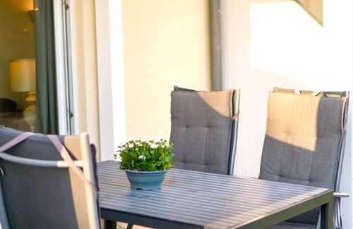 Gohren Apartment | Terrace, free use of the AHOI adventure pool and sauna - Sea view apartment 12