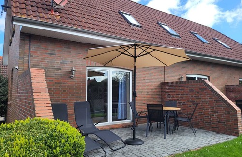 Wangerland Apartment | Terraced house 1/guest house "zur alten Schmiede
