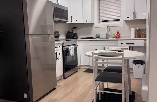 Saskatoon Apartment | Terracotta Luxury Suite- Your grounding oasis!
