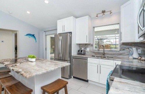 Pinehurst House | Terrific 3-bedroom heated pool house near beaches and golf courses!