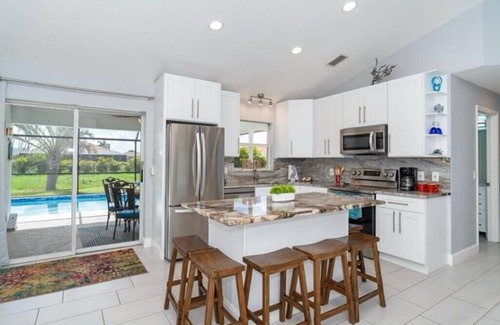 Pinehurst House | Terrific 3-bedroom heated pool house near beaches and golf courses!