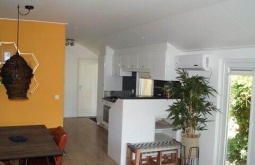 Markelo Ski Chalet | Thatched Home by Pond in Holiday Park