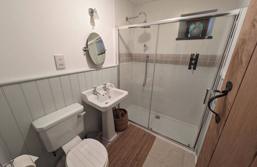Holsworthy Cottage | Thatched one bedroom cottage, with private enclosed garden.