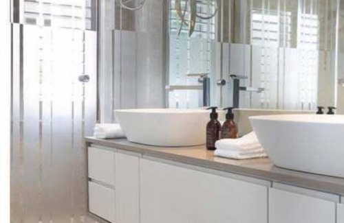Clifton Apartment | The Alikreukel: Designer Beachfront Apartment with Access Directly on the Beach