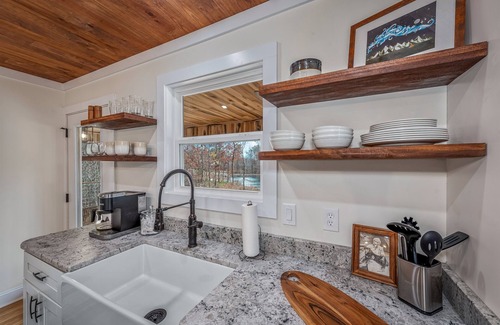 Mentone House | The Away Place-hot tub & fireplace on the lake