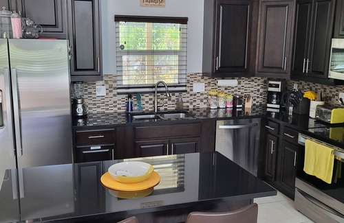 Merritt Island House | The Banana Cabana - A Tropical Florida Escape with Heated Pool!