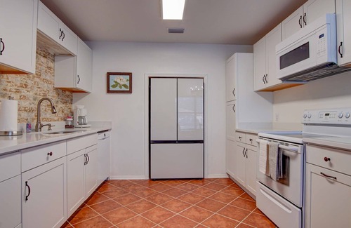 Panama City House | The Bay House - Pet Friendly! Basketball court, firepit - Walk to the Bay!