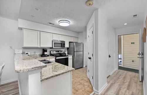 Carolina Forest Apartment | The Beach Hive overlooking River Oaks Golf Course