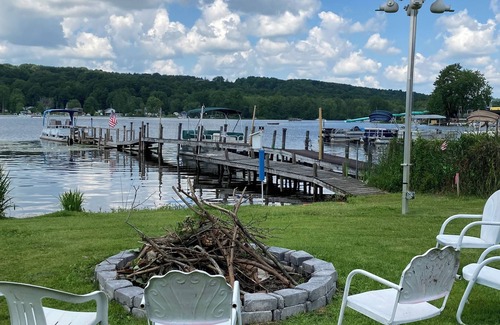 Canadohta Lake Cottage | The Bluebird, a rustic lakefront cottage at The Pier at Canadohta Lake sleeps 6!