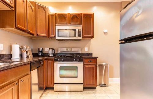 Mill River Apartment | The Brick House Wooster Sq at Yale with Skyline Deck and WD