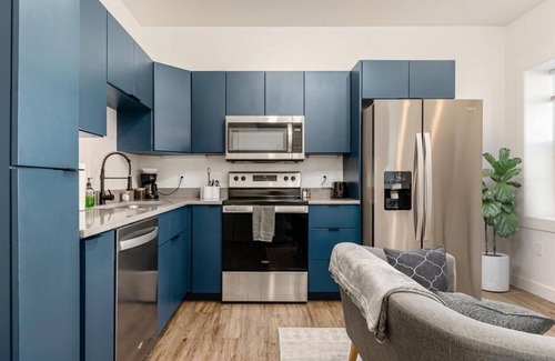 Near East Columbus Apartment | The Broad - Modern Design kitchen & Pet Friendly