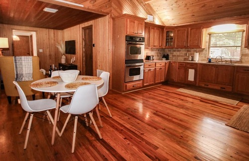 Bearss Plaza Cabin | The Cabin in The City with Outdoors Living Space