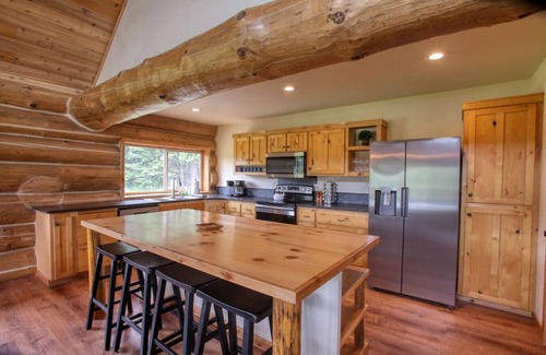 Bonner County Cabin | The Cabin · Rustic Log Cabin with Pasture and Mountain Views