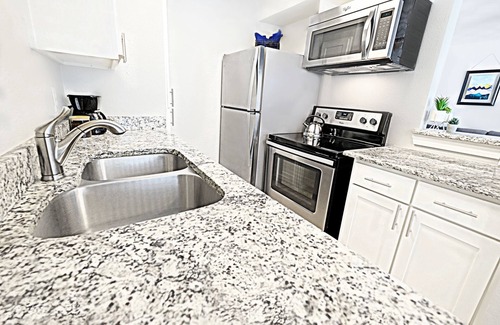 Old East Dallas Apartment | The City Escape Arboretum Tickets Included