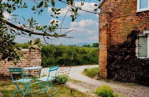 Eaton Mascott Cottage | THE COACH HOUSE BARN, pet friendly, with a garden in Dorrington