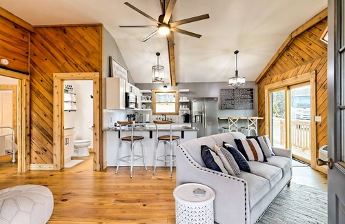 Blairsville Cabin | The Coop | Woodland cabin in Blairsville with wraparound porch & fireplace