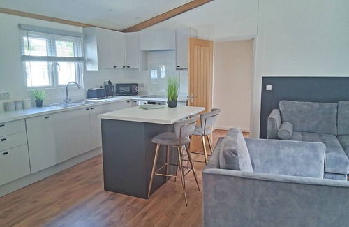 Langworth Ski Chalet | The Country oak is a 2 double bedroom lodge with en suites to both rooms.