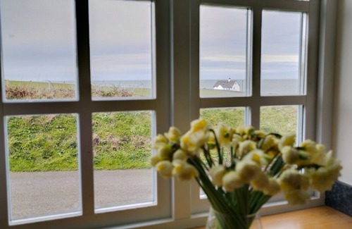 Llanfaethlu Apartment | The Dairy - an on the beach that sleeps 4 guests in 2 bedrooms