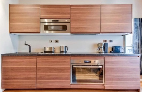 Quartier de la Folie-Mericourt Apartment | THE ESSENCE OF LE MARAIS & ITS SIGNATURE COBBLED STREETS