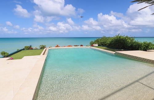 Dickenson Bay House | The Great House, Stunning 4-Bedroom Coastal Retreat with Panoramic Ocean Views