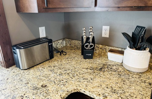 Helena House | The Grey House is 2 minutes to the Lake 5 minutes to Fox Ridge golf course.