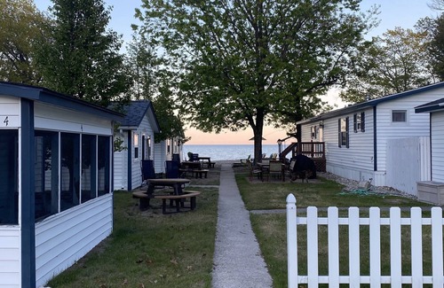 Oscoda Cottage | The Hideaway- Haven on HuronnA fresh and airy cabin directly on Lake Huron!