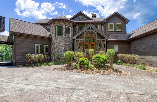 Sevierville Cabin | The King Of The Mountain-Breathtaking Views, 6617 Sq. Ft. Theater Room, Pool!