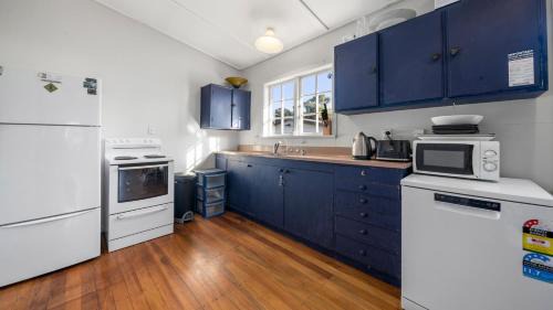 Waikanae House | The Little Blue Bach - Waikanae Beach Holiday Home