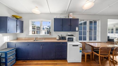 Waikanae House | The Little Blue Bach - Waikanae Beach Holiday Home