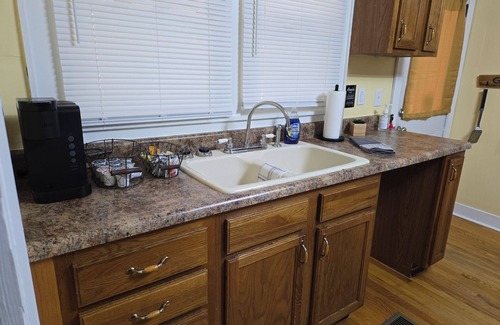 Russell Springs House | The Little Brown Cottage is a 1950's, two bedroom cottage in town with one bath.