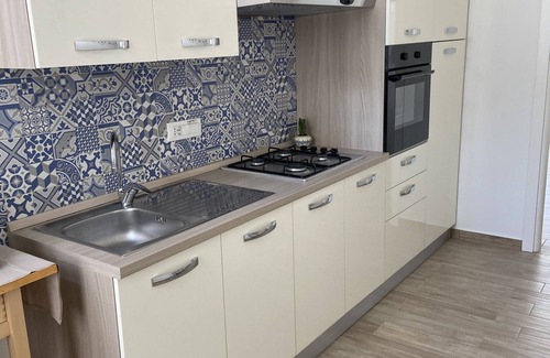 Santa Lucia Apartment | The Little House at 41. Bright apartment with modern and functional furnishings.