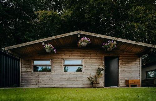 Llanddaniel Fab Apartment | The Little Lodge is a cosy luxury hideaway.
