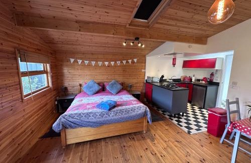 Llanddaniel Fab Apartment | The Little Lodge is a cosy luxury hideaway.