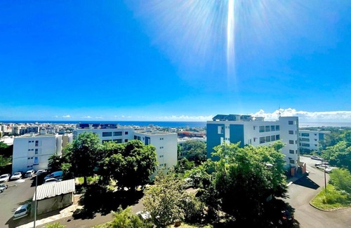 Saint-Denis Apartment | The Little Nest – Sea View, Comfort & Parking
