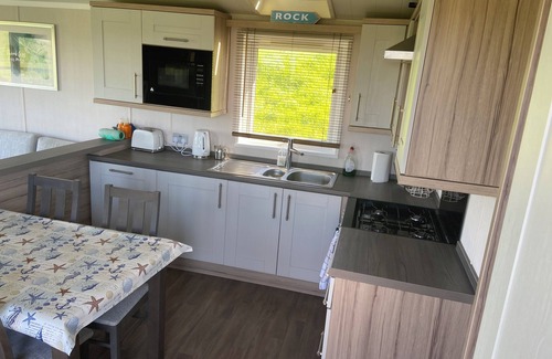 Mynytho Cottage | THE LODGE AT PENNANT-IGYN, pet friendly, with a garden in Llanbedrog