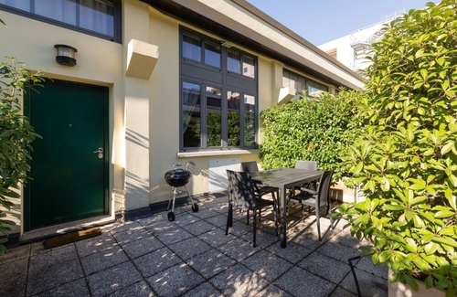 Ripamonti Corvetto Apartment | The Loft Quaranta is located in the Vigentino district of the city of Milan and boasts a spacious terrace equipped with outdoor furniture, barbecue and plants which guarantee considerable added value, especially on pleasant spring and summer evenings!It