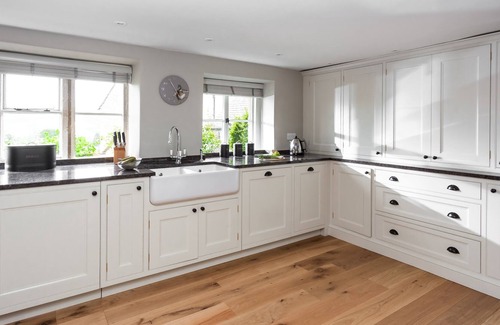 Guiting Power Cottage | The Nook boasts pretty views over the stunning Cotswolds rooftops in the village of Guiting Power