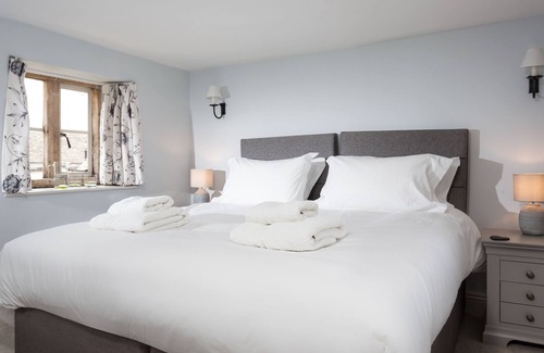 Guiting Power Cottage | The Nook boasts pretty views over the stunning Cotswolds rooftops in the village of Guiting Power