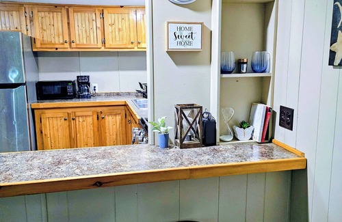 Luther House | The Northwoods Den- A terrific 2-bedroom house on 9 secluded acres in Luther MI