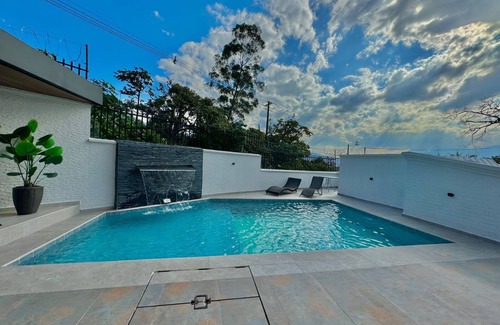 Las Lomas I Villa | The Oasis Eden 4 Bedroom Mansion Exotic Pool 5 min from Provenza,GUEST FRIENDLY.