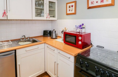 Lindale Cottage | THE OLD APPLE BARN, pet friendly, with a garden in Lindale