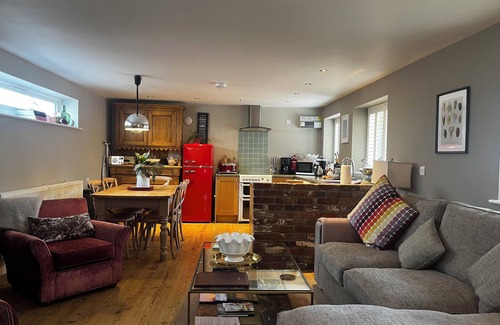 Hollington Cottage | The Old Smithy is a beautifully restored, luxury barn conversion set in the peaceful village of Hollington, just a short drive from the breathtaking landscapes of the Peak District National Park.