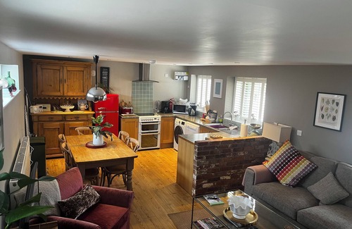 Hollington Cottage | The Old Smithy is a beautifully restored, luxury barn conversion set in the peaceful village of Hollington, just a short drive from the breathtaking landscapes of the Peak District National Park.