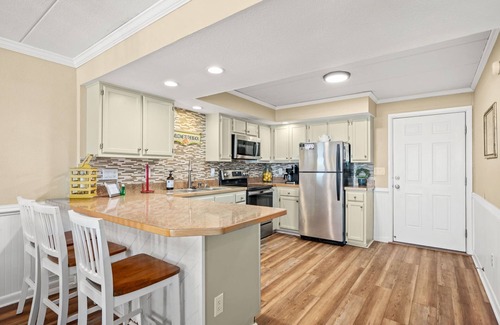 South Nags Head Condo | The Paisley Marlin: PierView Oceanfront Condo, Cozy Amenities and Incredible Vie